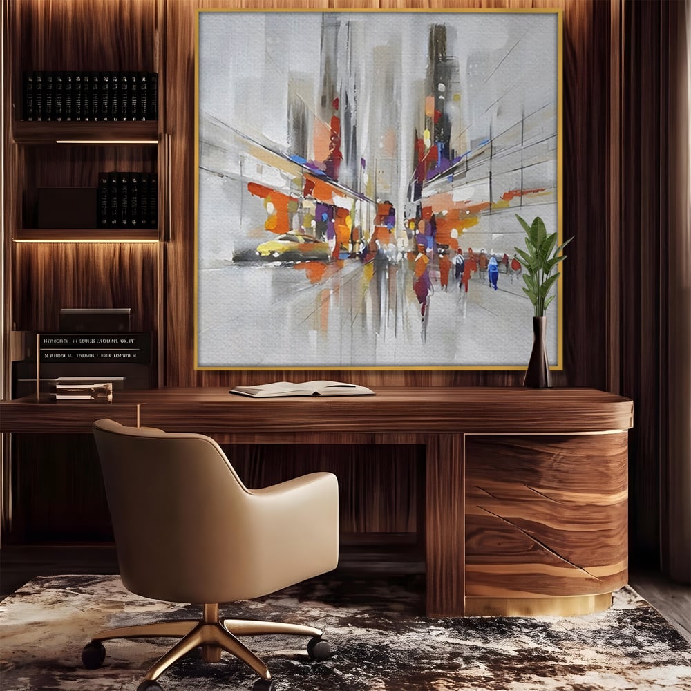 Tablou canvas cu pictura abstracta cu peisaj urban, in rama de aluminiu auriu, pe perete intr-un birou